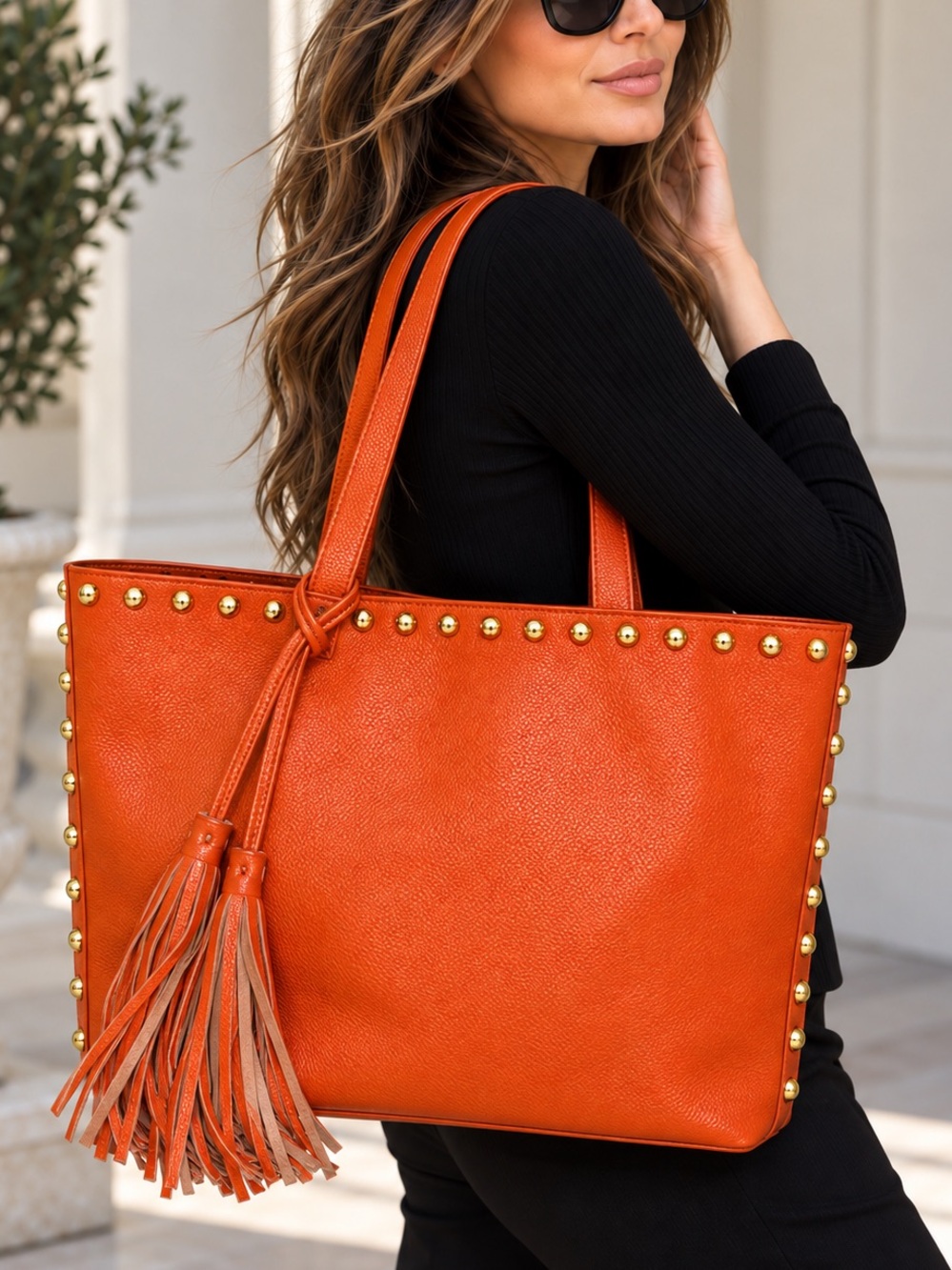 LAGGO Genuine Leather Orange Studded Tote Bag with Tassels